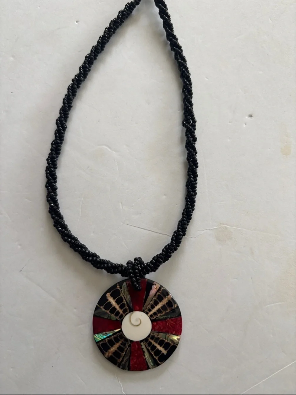Source Unknown Black Beaded Necklace with Red, Green and Ivory Inlay Pendant